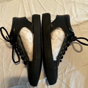BCBGeneration black and clear tennis shoes